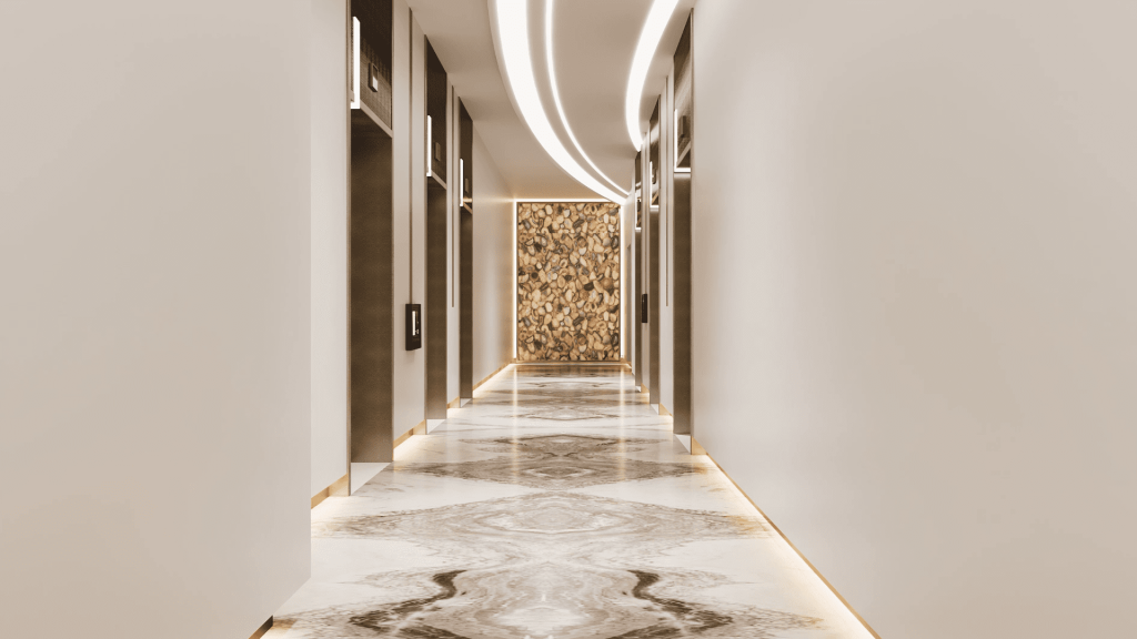 Ein moderner, eleganter Hotelflur mit Marmorboden und stilvollen Wandakzenten, die von einer eleganten, gebogenen LED-Deckenbeleuchtung erhellt werden, schafft eine luxuriöse Atmosphäre in diesem erstklassigen Immobilienobjekt in Dubai.