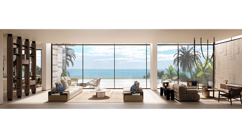 Luxueux salon décloisonné dans une villa de Dubaï avec des baies vitrées donnant sur une vue sur l'océan tropical, meublé de canapés modernes, de chaises et d'une table basse, menant à une terrasse extérieure avec