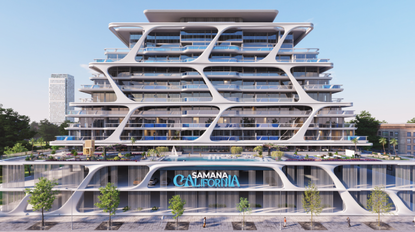 Une villa architecturale moderne à Dubaï présentant des contours blancs fluides et futuristes et plusieurs niveaux avec des terrasses verdoyantes, nommée « Samana California », située dans un environnement urbain pendant la journée.