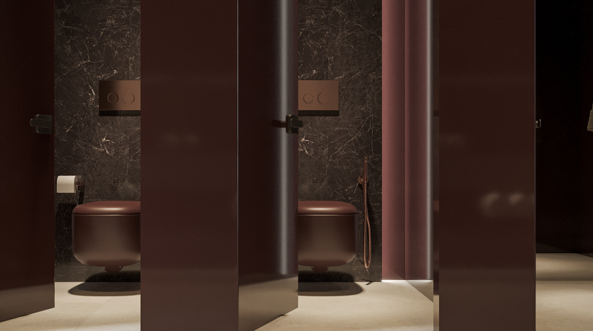 Intérieur de toilettes modernes avec murs en marbre foncé dans une villa de Dubaï, comprenant une porte de cabine ouverte révélant des toilettes avec un plafonnier et un tapis circulaire. Un éclairage chaleureux rehausse l’ambiance sophistiquée.