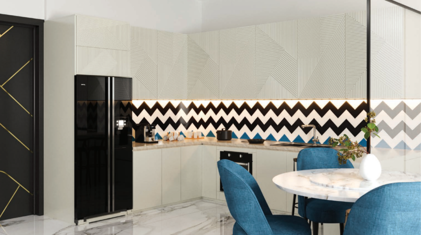 Intérieur de cuisine moderne avec murs à motifs géométriques, réfrigérateur noir élégant, comptoirs en marbre et table ronde avec chaises bleues. Des éléments de design élégants et contemporains sont visibles dans toute cette villa à Dubaï.