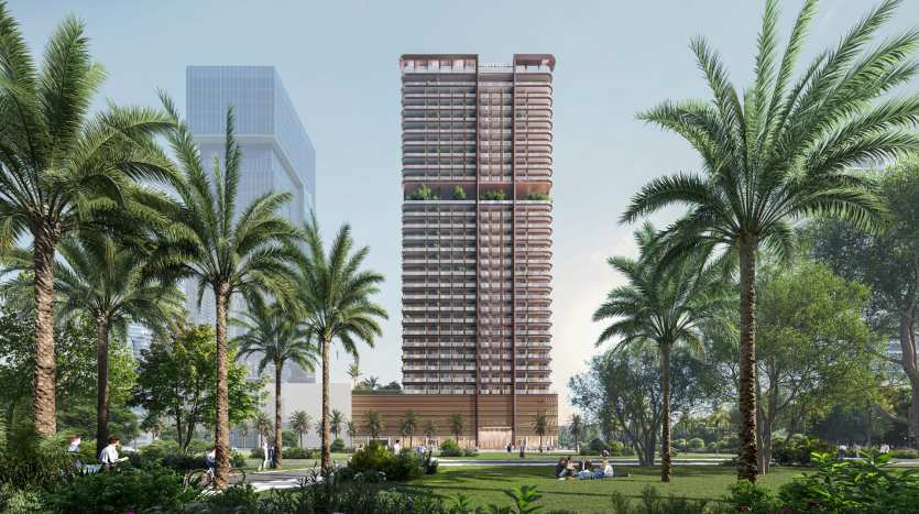 Un immeuble moderne de grande hauteur entouré de palmiers verdoyants, où les gens profitent nonchalamment du parc dans un cadre ensoleillé de Dubaï.