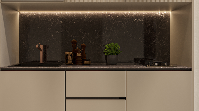 Un comptoir de cuisine moderne doté d&#039;un dosseret en marbre foncé aux veines complexes, accentué par un éclairage ambiant doux. Le comptoir contient des ustensiles de cuisine, un moulin à poivre en bois et une petite plante en pot