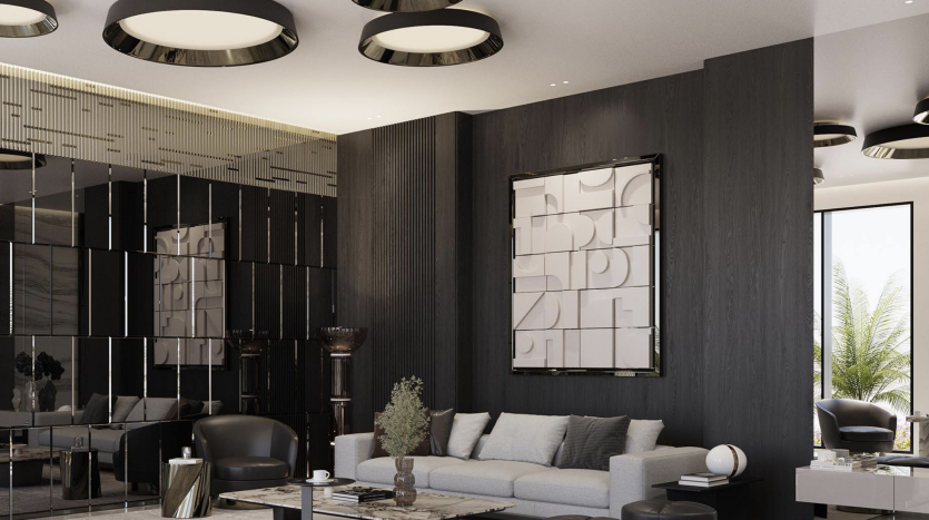Un salon moderne dans un appartement de Dubaï avec des boiseries noires et des plafonniers circulaires. Il comprend un canapé sectionnel gris, des accents muraux en miroir et une peinture abstraite sur le mur.