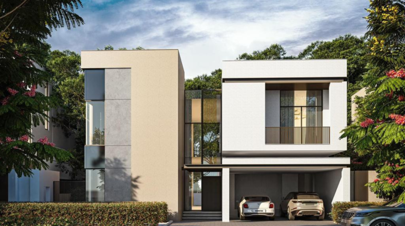 Villa moderne de deux étages à Dubaï avec un toit plat, dotée de grandes fenêtres et d&#039;un design minimaliste, entourée d&#039;une verdure luxuriante et d&#039;arbres en fleurs. Deux voitures sont garées sous une allée couverte.