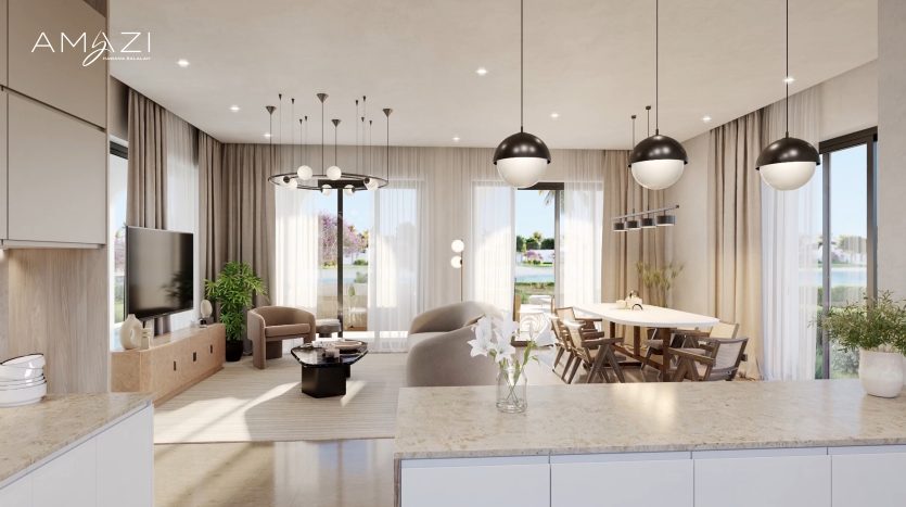 Salon et salle à manger modernes et décloisonnés avec un mobilier contemporain, des suspensions et de grandes fenêtres offrant une vue sur une villa à Dubaï, conçues dans une palette de couleurs neutres.