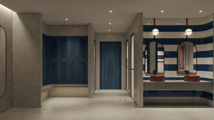 Salle de bains au design moderne avec des murs rayés aux couleurs bleu marine et blanc, deux lavabos rouges, des miroirs muraux et un espace douche à gauche, mis en valeur par des plafonniers ambiants dans une villa de Dubaï.