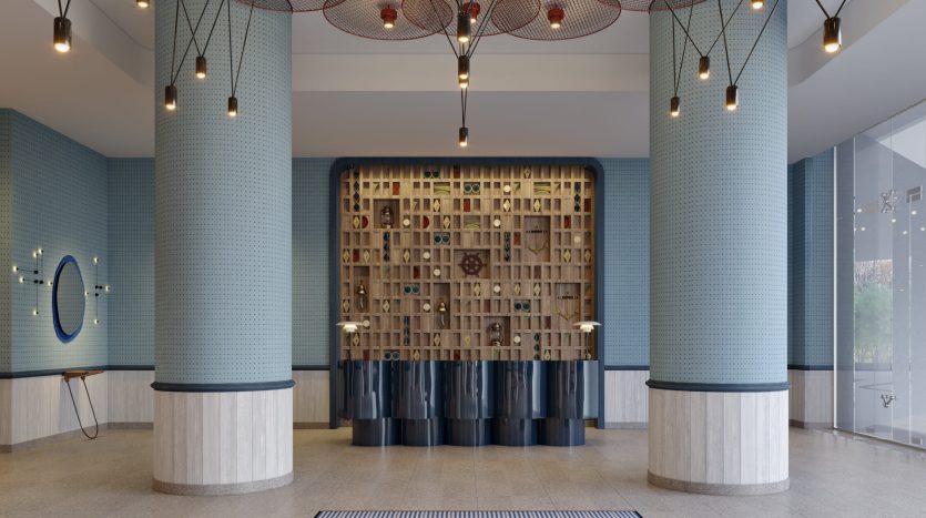 Un hall d&#039;hôtel moderne avec des piliers cylindriques texturés bleus, des comptoirs de réception noirs et des lustres en fil rouge uniques. Le mur du fond présente divers compartiments avec des objets décoratifs inspirés des styles de l&#039;immobilier de Dubaï.