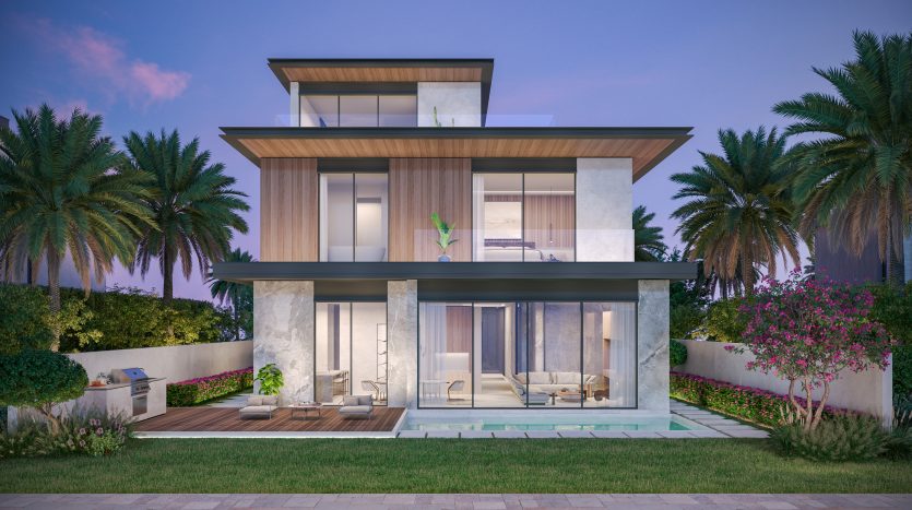 Une maison moderne à deux étages avec de grandes fenêtres vitrées, entourée de palmiers luxuriants et de buissons à fleurs roses, disponible via une agence immobilière renommée de Dubaï, au crépuscule.