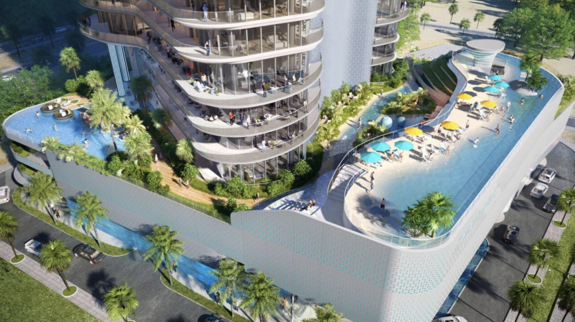 Vue aérienne d&#039;un complexe de villas modernes à Dubaï avec une piscine sur le toit et des espaces paysagers verdoyants, entourés de rues urbaines avec des voitures.