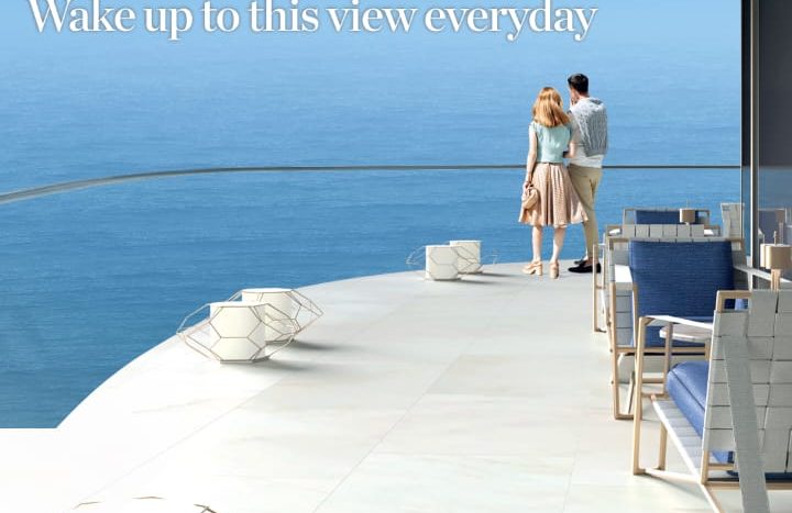Publicité pour Oceanz Danube Properties présentant une vue sereine sur l&#039;océan et un ciel dégagé, le logo de Tonino Lamborghini Casa, avec un texte mettant en valeur les intérieurs de luxe et un réveil quotidien avec cette vue panoramique. Explorer