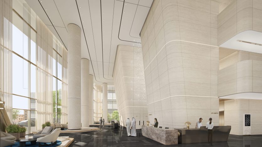 Lobby d&#039;hôtel moderne avec une architecture incurvée élégante, de grandes fenêtres, un décor minimaliste et plusieurs personnes interagissant près de la réception, idéal pour investir à Dubaï.