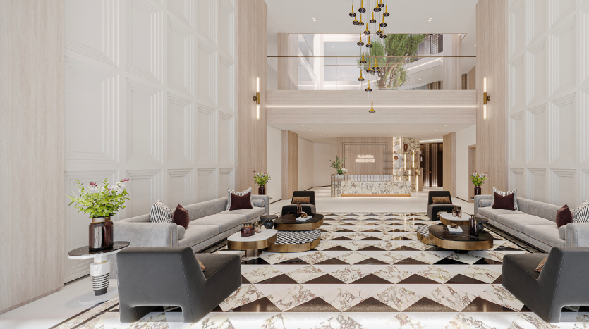 Le hall d&#039;une luxueuse villa à Dubaï comprend un sol à motifs géométriques, des sièges luxueux, des lustres ornés et un grand escalier menant à un niveau supérieur avec balcons.