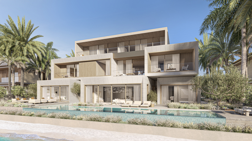 Une villa moderne à plusieurs niveaux à Dubaï avec de grandes terrasses et une piscine à débordement, entourée de palmiers luxuriants et surplombant une plage sereine.