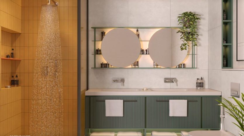 Une salle de bains moderne dans une villa de Dubaï comprend une douche en verre, un meuble-lavabo vert à double vasque avec des miroirs ronds, des murs blancs, des plantes suspendues et un code QR dans le coin pour plus d&#039;informations.