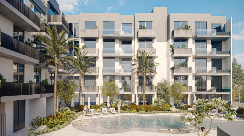 Complexe d'appartements moderne à Dubaï avec des palmiers, une piscine extérieure et des résidents profitant de la journée ensoleillée. Le bâtiment dispose de balcons spacieux et d'un design contemporain.