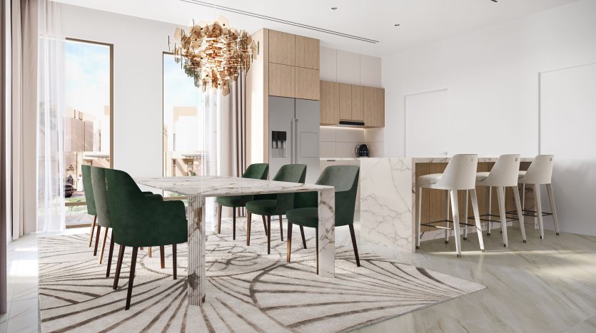 Une cuisine et un coin repas modernes dans une villa de Dubaï avec des armoires en bois élégantes, une table à manger en marbre avec des chaises en velours vert et un sol blanc poli, éclairé par la lumière naturelle provenant de grandes fenêtres.