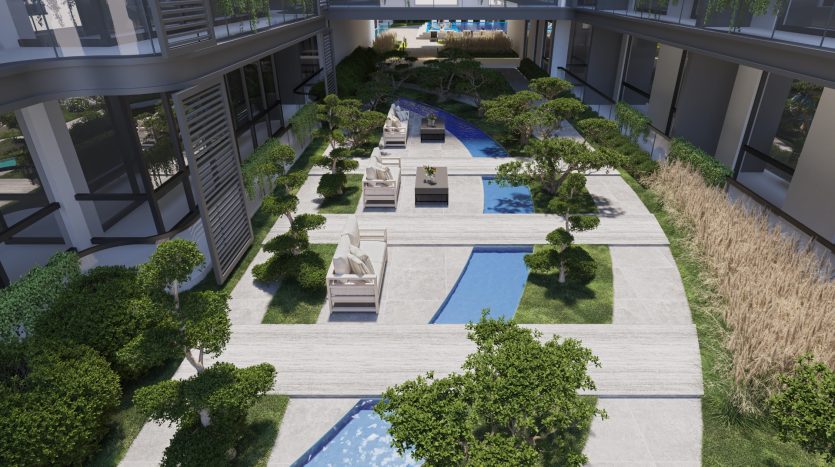 Conception de cour moderne avec piscines rectangulaires, coins salons soigneusement agencés, entourés d&#039;arbres verts luxuriants et d&#039;allées avec vue sur les immeubles de grande hauteur environnants à Dubaï.