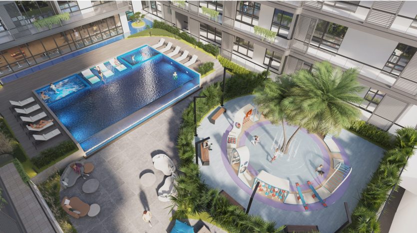 Vue aérienne d&#039;une luxueuse zone de loisirs extérieure à Dubaï comprenant une grande piscine et une piscine séparée pour enfants entourée de palmiers, de chaises longues et d&#039;une architecture moderne.