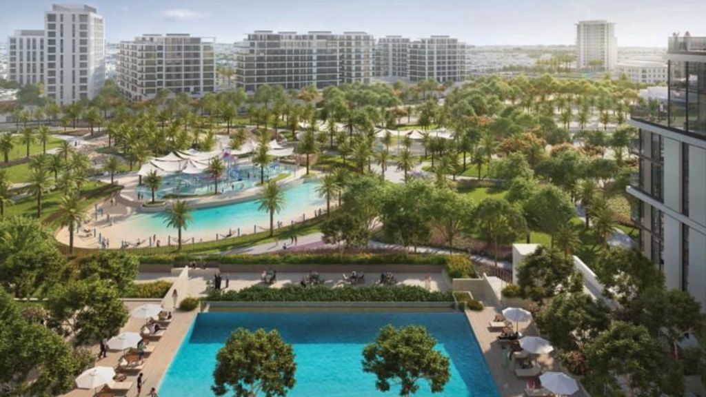 Vue aérienne d&#039;un parc urbain moderne avec une grande piscine, des salons ombragés et un espace de rassemblement animé couvert d&#039;un auvent, entouré d&#039;immeubles d&#039;appartements à plusieurs étages de Dubaï.