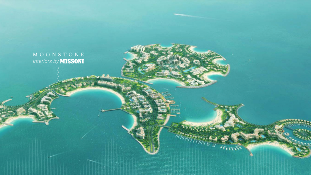 Vue aérienne d&#039;un développement insulaire de luxe conceptuel à Dubaï appelé « Moonstone by Missoni », présentant des paysages luxuriants et une architecture moderne, entourés d&#039;eaux turquoise.