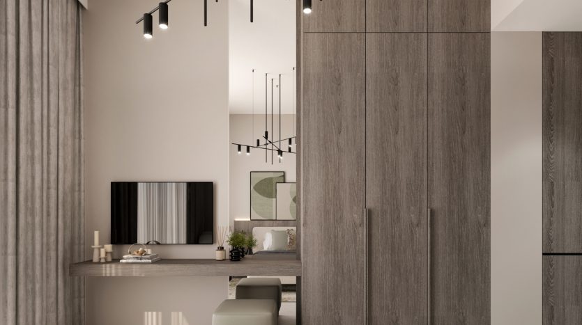 Salon moderne dans un appartement de Dubaï au design minimaliste, avec des tons neutres, des armoires en bois et un éclairage contemporain, comprenant un espace télévision et une vue partielle sur un espace salle à manger.