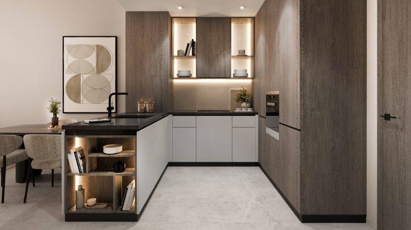 Intérieur de cuisine moderne avec armoires en bois sombre et comptoirs gris, comprenant un coin repas intégré dans une luxueuse villa de Dubaï. Un éclairage doux rehausse le décor minimaliste.