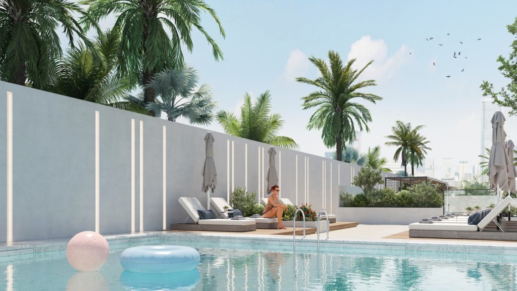 Une scène tranquille au bord de la piscine avec un homme se relaxant sur une chaise longue, entouré de palmiers luxuriants, d&#039;un ciel bleu clair et d&#039;une villa moderne à Dubaï.