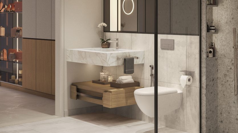 Une salle de bains moderne dans une villa à Dubaï, comprenant un lavabo en marbre, une vasque en bois, des toilettes murales et une cloison de douche en verre transparent. Il y a aussi un miroir éclairé et des étagères bien disposées avec