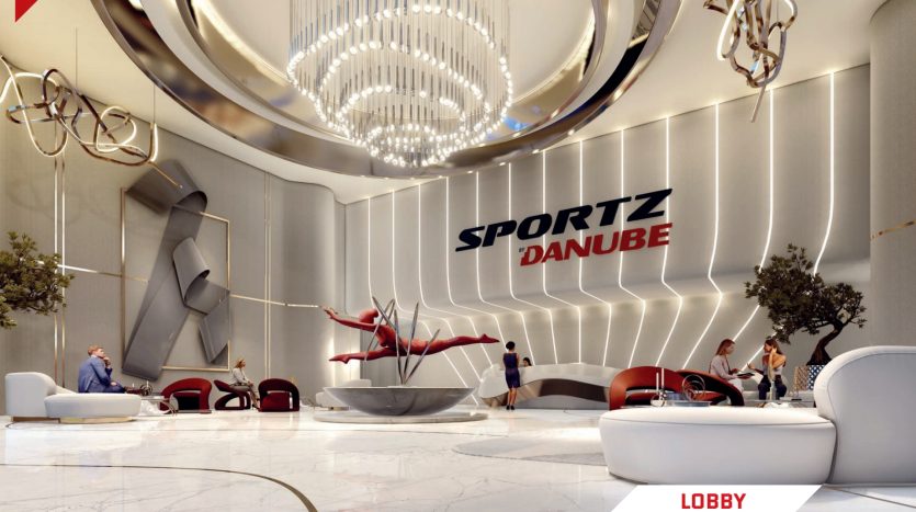 Un hall d'entrée d'hôtel moderne avec un intérieur élégant, avec un gymnaste jouant sur des soieries aériennes, des sièges luxueux et une grande pancarte indiquant « villa dubai » sous un éclairage décoratif.