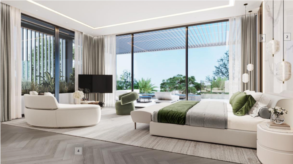 Un salon moderne dans un appartement de Dubaï avec de grandes fenêtres, des meubles blancs et vert tendre, une grande télévision et une vue sur un jardin. Les tons neutres et le design élégant dominent l'intérieur.
