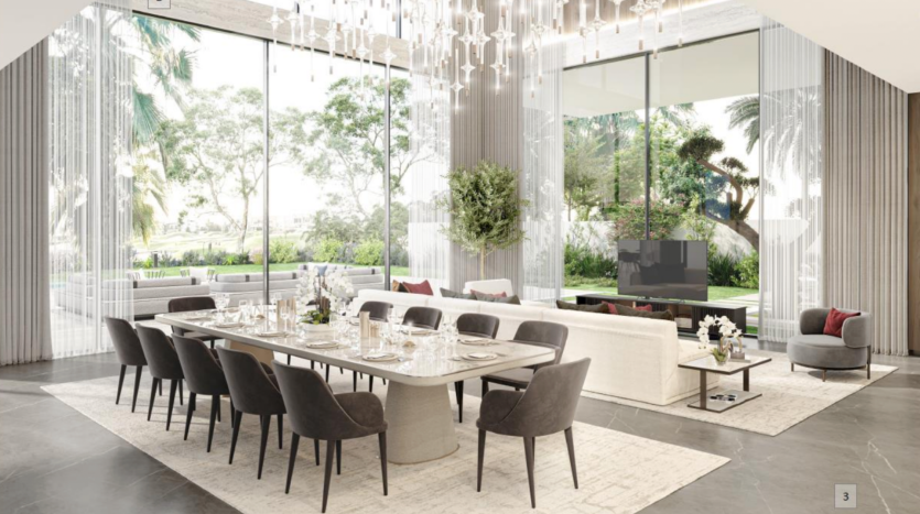 Une salle à manger luxueuse dans une villa à Dubaï avec une longue table dressée pour huit personnes, de grandes baies vitrées révélant un jardin luxuriant, des lustres modernes et un coin salon avec canapés et télévision