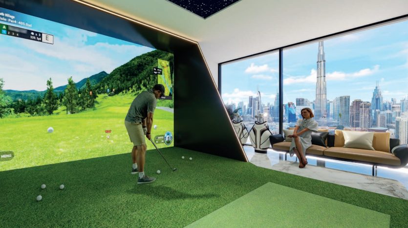 A man plays virtual golf in an indoor setting offering panoramic views of Dubai's cityscape, while a woman reclines on a sofa watching him. The room is modern and spacious, with large screens displaying the game.