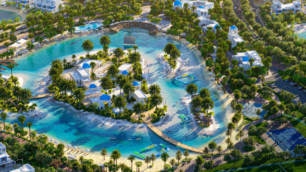 Vue aérienne d'un luxueux complexe tropical de Dubaï avec des piscines sinueuses, des plages artificielles, une verdure luxuriante, des villas blanches et des gens profitant de l'eau.
