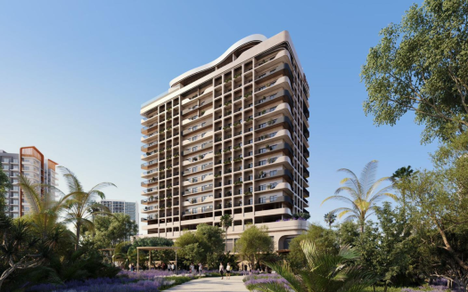 Un immeuble résidentiel moderne de grande hauteur entouré de jardins luxuriants, avec des gens marchant sur des sentiers et des palmiers se balançant au premier plan sous un ciel bleu clair, disponible via une première agence immobilière de Dubaï.