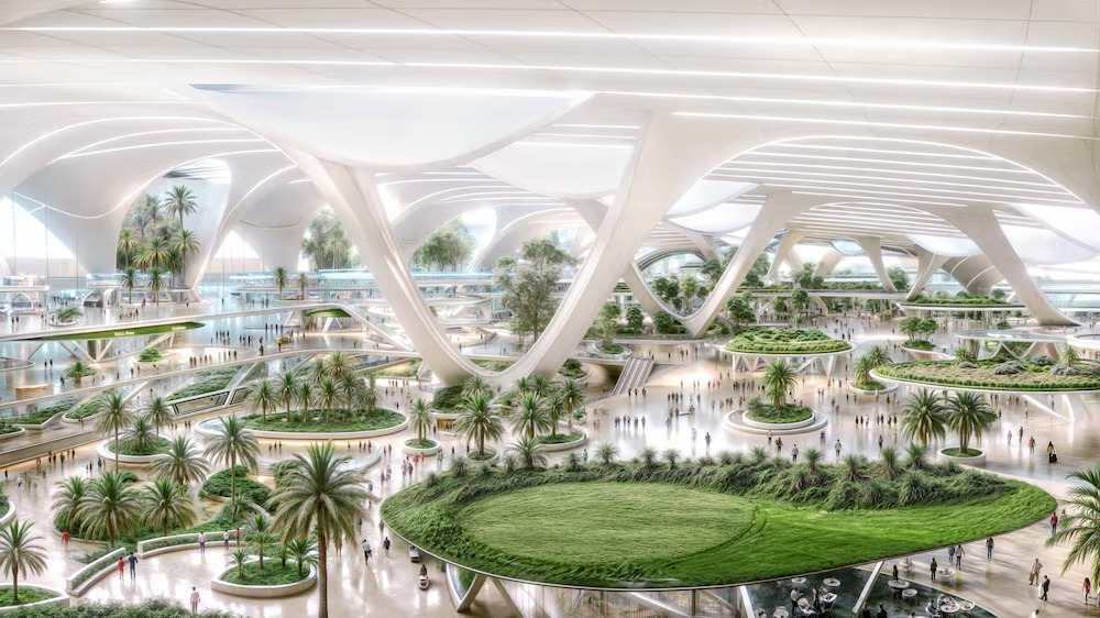 Parc intérieur futuriste à la conception architecturale blanche et élégante, avec des courbes fluides et de vastes espaces verts, peuplés d'arbres, de plantes et de sentiers pédestres à Dubaï, grouillant de visiteurs.