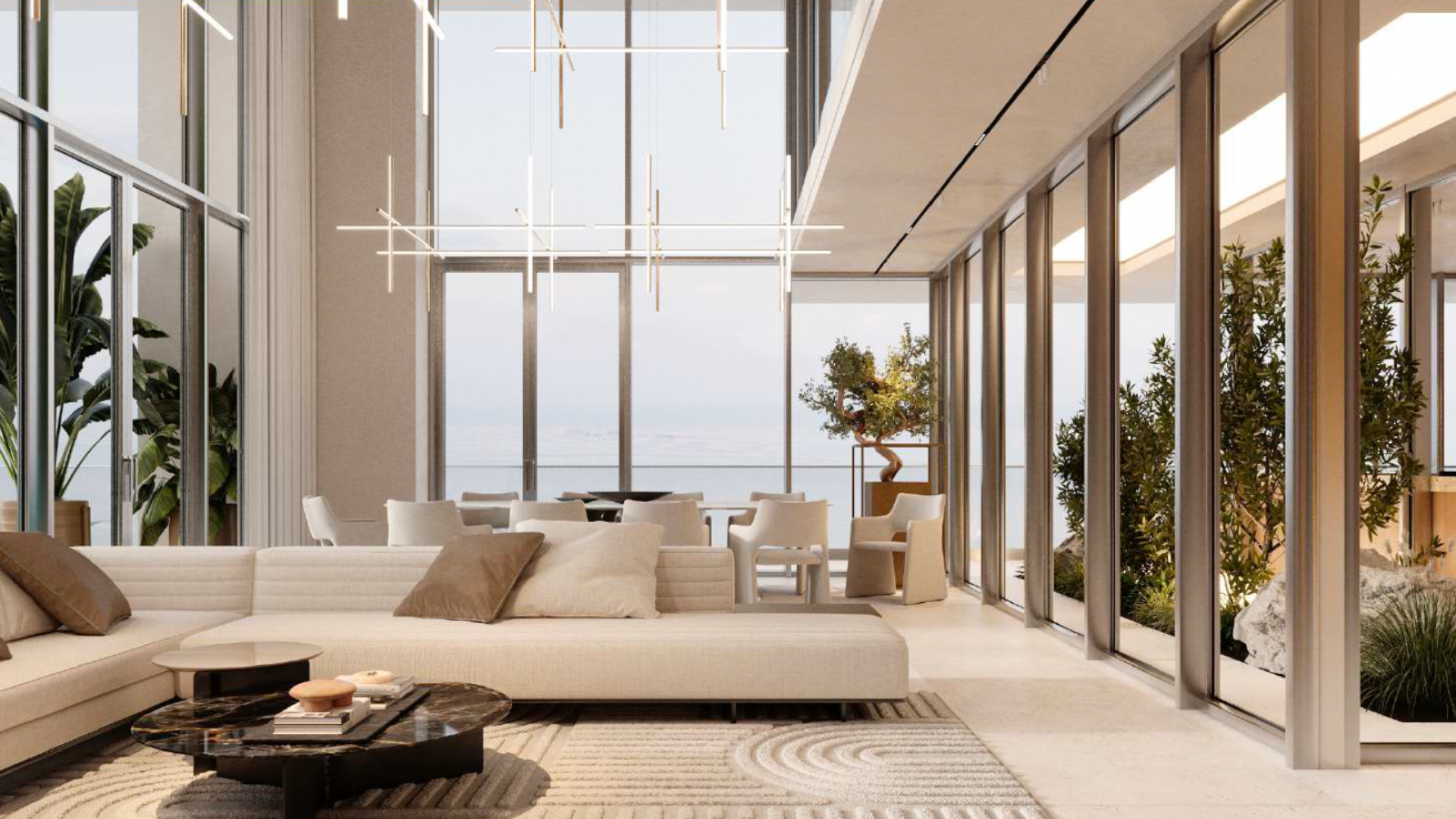 Salon moderne dans un appartement de Dubaï doté de grandes fenêtres donnant sur l'océan, doté d'un canapé sectionnel blanc, d'une décoration aux tons neutres et de suspensions contemporaines. Les plantes d'intérieur ajoutent une touche de verdure.