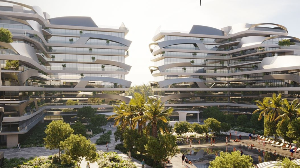 Un complexe architectural moderne, Tonino Lamborghini Residences Dubai, comprend deux bâtiments à plusieurs étages avec des balcons incurvés et reliés entre eux et une verdure abondante. Le premier plan présente un espace paysager avec des palmiers, une piscine et des gens se prélassant au bord de la piscine.