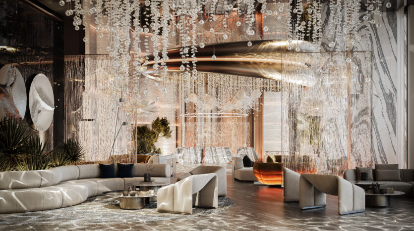Luxurious, modern living room at Allura Residences with elegant chandeliers, metallic accents and hanging crystal decorations. It features elegant beige sofas around coffee tables, contemporary chairs and warm mood lighting. The space includes abstract art and lush green plants for a refined atmosphere.