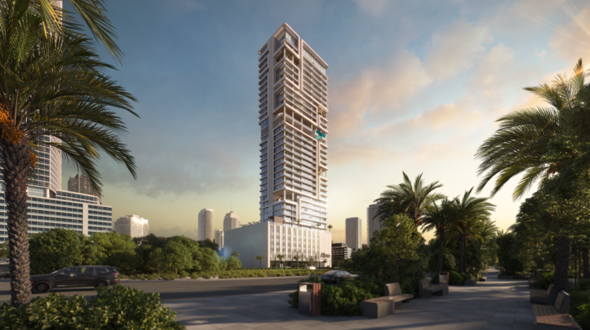 A modern, high-rise skyscraper designed by Allura Citi Developers stands amidst an urban landscape at sunset. Palm trees and landscaped green spaces line the foreground, while a few clouds dot the sky. Nearby buildings suggest an urban setting.