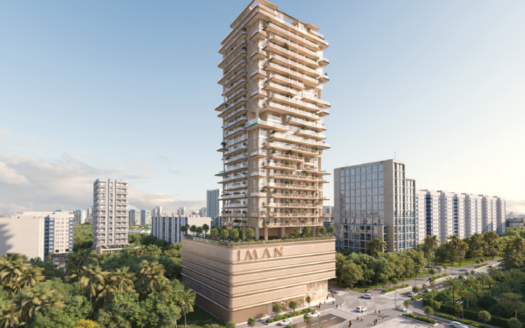 Un immeuble moderne de grande hauteur baptisé « AMAN » se dresse fièrement sur un ciel dégagé. Il dispose de plusieurs balcons et est entouré par le paysage animé de One Park Square, avec d'autres bâtiments, de la verdure et des rues animées de la ville qui rehaussent le paysage.