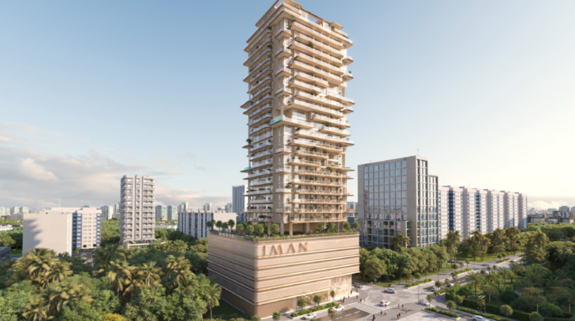 Un immeuble moderne de grande hauteur baptisé « AMAN » se dresse fièrement sur un ciel dégagé. Il dispose de plusieurs balcons et est entouré par le paysage animé de One Park Square, avec d'autres bâtiments, de la verdure et des rues animées de la ville qui rehaussent le paysage.