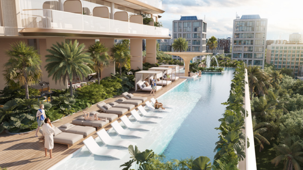 La piscine moderne sur le toit du One Park Square est dotée de chaises longues partiellement immergées dans l'eau, entourées d'une végétation luxuriante et de palmiers. Les clients peuvent se détendre au bord de la piscine sous des cabanes ombragées tandis que de hauts bâtiments aux façades vitrées dominent l'arrière-plan.