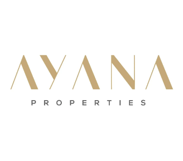 Le logo d'Ayana Properties présente « AYANA » en grandes lettres dorées stylisées bien en évidence au-dessus de « PROPERTIES » en lettres grises plus petites, le tout sur un fond blanc éclatant.