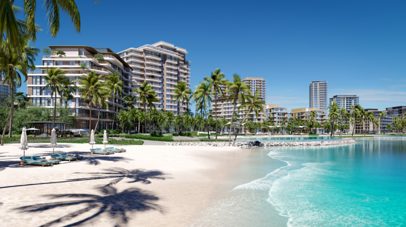 Une plage immaculée aux eaux turquoise et claires, avec des chaises longues à l'ombre des parasols. En arrière-plan, de grands bâtiments modernes et de nombreux palmiers se balancent sous un ciel bleu clair, créant une scène côtière sereine et luxueuse.