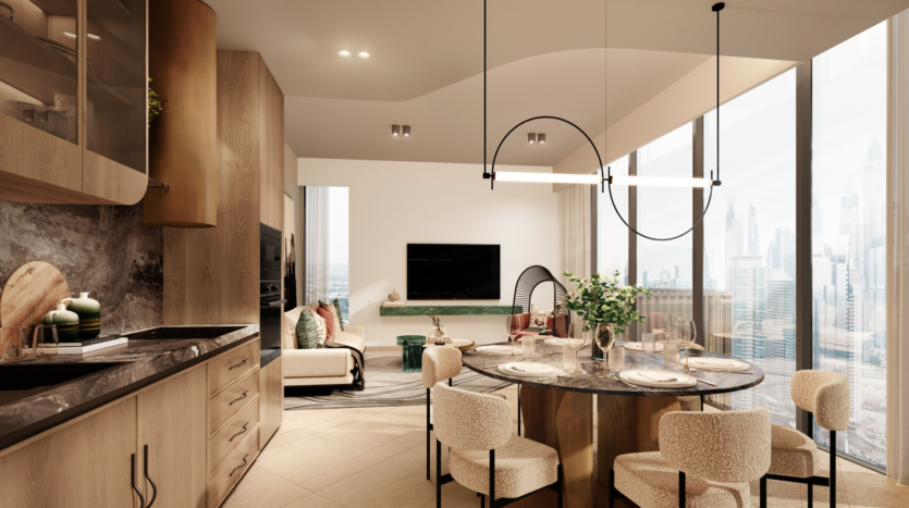 Intérieur moderne de l'appartement W Residences, comprenant une table à manger ronde avec six chaises, une cuisine élégante sur la gauche et un salon confortable avec canapé et télévision. De grandes fenêtres mettent en valeur l'horizon des Jumeirah Lake Towers, renforçant l'atmosphère lumineuse et aérée de l'espace.