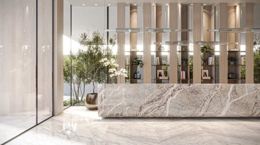 The modern lobby of the Legado Prescott Hotel features a marble reception counter, wooden shelves and decorative plants. Natural light streams in through large windows, enhancing the minimalist design and elegant décor.