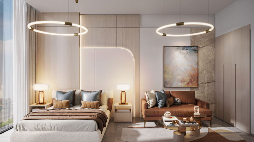 A modern bedroom with a comfortable double bed, elegant lamps and a large painting on the right-hand wall exudes Legado Prescott charm. A brown sofa and round coffee table add comfort, while circular ceiling lights cast a warm glow. A large window lets in plenty of natural light.
