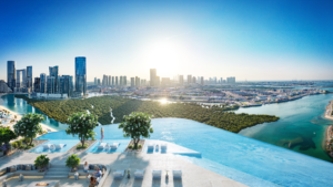 La splendida piscina a sfioro di Le Rivage si affaccia sullo skyline urbano al tramonto. La vegetazione lussureggiante si annida tra i moderni grattacieli e i tortuosi corsi d'acqua, creando un sereno contrasto. I posti a sedere a bordo piscina offrono un luogo lussuoso per ammirare la vista panoramica.