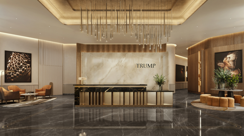 Le luxueux hall de l'hôtel, qui fait partie de la célèbre Trump Tower, dispose d'un comptoir de réception en marbre sur lequel est élégamment inscrit le mot « TRUMP ». Un éclairage sophistiqué illumine les espaces salons élégants et les murs ornés d'œuvres d'art, renforçant ainsi l'atmosphère raffinée.